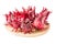 Roselle fruit isolated on wood plate