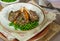 Rosemary lamb chops with carrot and parsnip mash and green peas