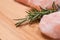 rosemary placed between large pink salt stones