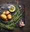 Rosemary Potatoes preparation with oil,garlic and spices