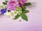 Roses beautiful border design vintage season frame on a pink wooden background jasmine, magnolia summer