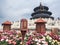 Roses decorating the facade of The Hall of Prayer for Good Harvest at the Temple of Heaven, Beijing, China, Asia