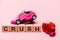 Roses, toy car and word crush