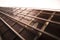 Rosewood bass guitar fret board and strings