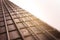 Rosewood bass guitar fret board and strings