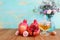 Rosh hashanah jewesh holiday concept - honey, pomegranate and apple holiday traditional symbols