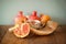 Rosh hashanah (jewesh holiday) concept - shofar, honey, apple and pomegranate over wooden table. traditional holiday symbols.