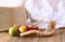 Rosh hashanah (jewesh holiday) concept - shofar, torah book, honey, apple and pomegranate over wooden table. traditional holiday