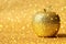 Rosh hashanah & x28;jewish New Year holiday& x29; concept. Traditional symbol, decorative glitter gold apple.