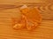 Rosin isolated on wooden background