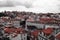Rossio. Lisbon. Portugal. Red black and white. Sityscape. Old town historic homes. Clouds. Sky.
