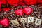 rosted coffee beans with heart chocolates red flowers and LOVE letter