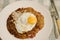 Rosti potatoes with fried egg