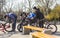 Rostov-on-don, Russian Federation, March 25, 2019. A company of young teenage boys sitting on their bikes and waiting for their