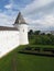 Rostov Kremlin. View of watch tower and metropolitan garden.