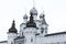 Rostov, Russia, 09.22.2022. Domes, towers and part of the wall of the Rostov Kremlin close-up.