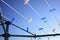 Rotary clothes dryer detail against blue sky