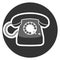 Rotary dial operated telephone icon or symbol