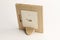 Rotary miniature wooden frames cut for photographs or paintings, photographed on a white background