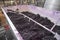 Rotating arms pumping over fermenting red wine grapes, McLaren Vale, South Australia