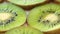 Rotating background of green kiwifruit