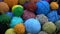 Rotating colorful yarn wool balls for knitting background