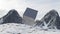 Rotating cube on background of mountains. Design. Mysterious animation of metal cube rotating on background of mountains