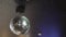 rotating disco ball on the ceiling of the room