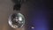 rotating disco ball on the ceiling of the room