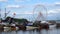 Rotating ferris wheel in the port of Honfleur, Normandy