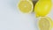 Rotating fresh lemons on a white background