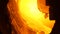 Rotating furnace in factory. Stock footage. Close-up of incandescent material spreading in rotating furnace in factory