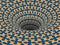 Rotating hole of moving blue orange cruciform shapes pattern. Vector optical illusion illustration