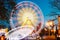 Rotating In Motion Effect Illuminated Attraction Ferris Wheel On