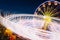 Rotating In Motion Effect Illuminated Attraction Ferris Wheel On