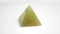Rotating Prism Triangle Onyx Stone Pyramid Green On White Plate Bright Closeup Energy Chakra