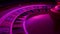 Rotating roulette wheel close up in the rays of purple neon lights. The small white ball hits black 13. Part of the