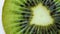 Rotating slice of fresh kiwi