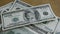 Rotating stock footage shot of $100 bills