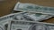 Rotating stock footage shot of $100 bills