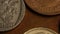 Rotating stock footage shot of international monetary coin