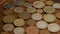 Rotating stock footage shot of international monetary coins