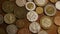 Rotating stock footage shot of international monetary coins