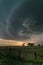 Rotating thunderstorm (supercell) in northwestern Oklahoma at sunset.