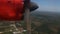 Rotation of Airplane Propeller Flying above Tropical Plantations