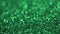 Rotation background .Holiday shiny background. Green shiny background with metallic glitter.