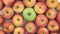 Rotation close-up, the background of green and red apples.