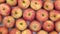 Rotation close-up, background of red apples.