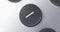 Rotation. Close-up of black button with MINUS symbol.