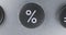 Rotation. Close-up of black button with PERCENT symbol.